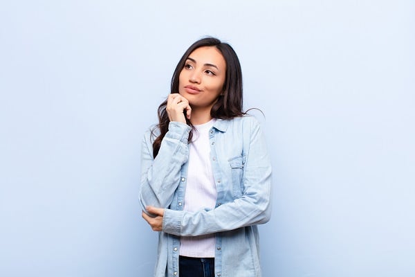 Woman wondering is teeth whitening painful?